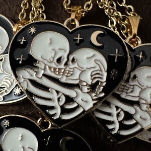 Black and Gold Heart Skeleton Eternal Embrace Pendant Necklace